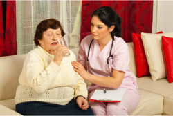 elderly taking her medication